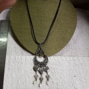 Silvertone Crystal faux pearl dangle charms necklace black cord